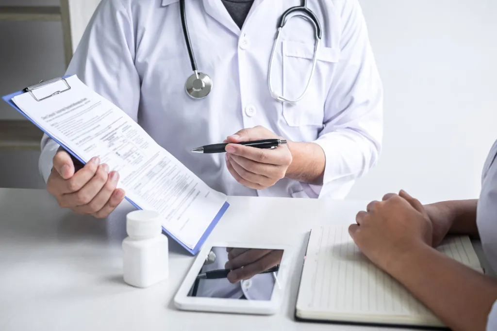Doctor consulting with patient