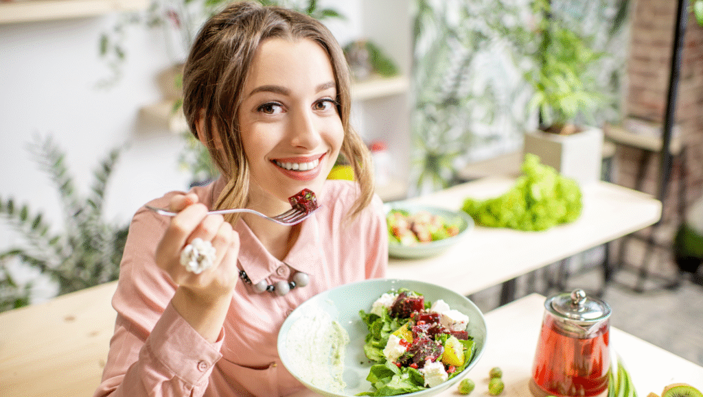 Assorted fresh fruits, vegetables, and a bowl of cereal with measuring tape symbolising healthy eating and weight management.